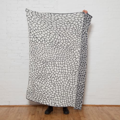 Peel Reversible Throw | Smoke/milk | Linens & Bedding by Jill Malek Wallpaper. Item composed of cotton