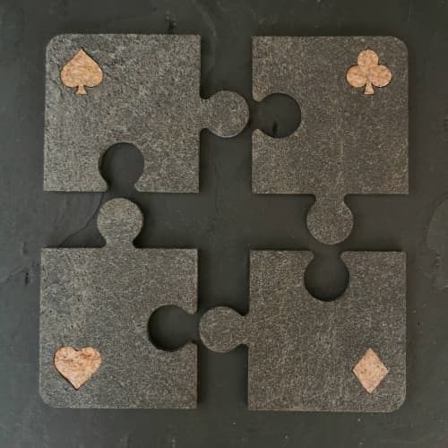 Gray stone Puzzle serving coasters for cups. Set of 4 | Tableware by DecoMundo Home. Item made of fabric & stone compatible with minimalism and industrial style