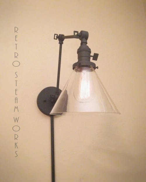 Plug in Swinging Adjustable Wall Light - Industrial Sconce | Sconces by Retro Steam Works. Item composed of metal and glass in industrial style