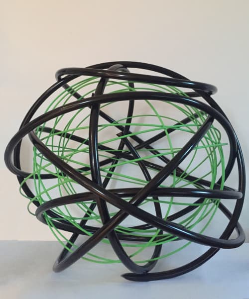 Green in Black Orb | Public Sculptures by Mark Beattie MRSS | Paddington Basin in London. Item composed of steel
