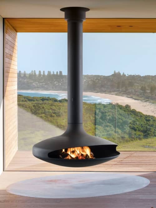 Gyrofocus Fireplace | Fireplaces by European Home | Southern Ocean Lodge in Kingscote. Item composed of metal