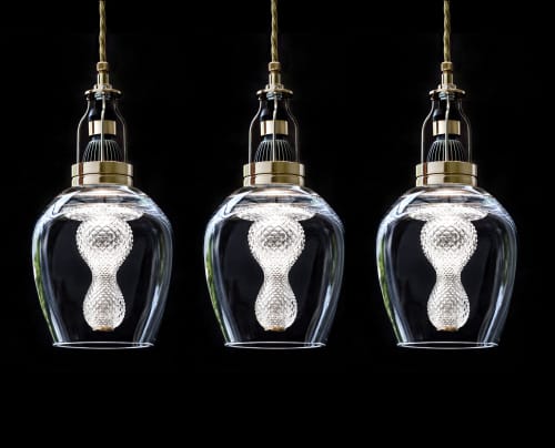 Blown glass/crystal inserts #44 Triplets | Pendants by Vitro Lighting Designs. Item composed of bronze & glass compatible with mid century modern style
