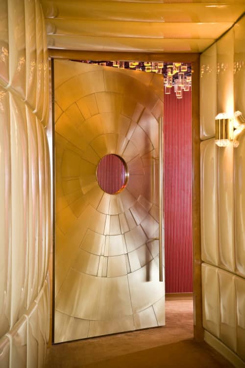 Bronze Radial Relief Door | Furniture by Amuneal | The Standard, High Line in New York. Item made of wood