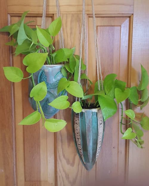 Hanging ceramic conical planters | Vases & Vessels by Julie Berkowitz Ceramics. Item made of ceramic