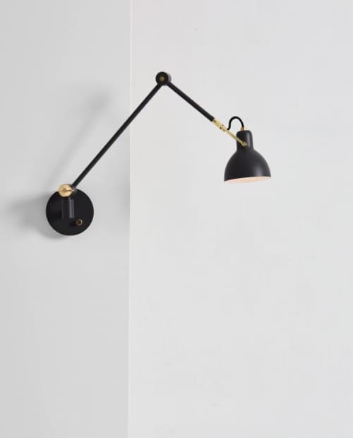 Laito Gentle Wall Sconce | Sconces by SEED Design USA. Item made of steel