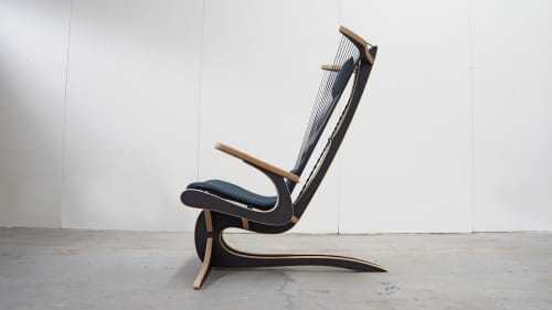Hippokamp Lounge Chair & Footstool - Fabric | Chairs by Peter Qvist. Item made of birch wood with fabric works with minimalism & contemporary style