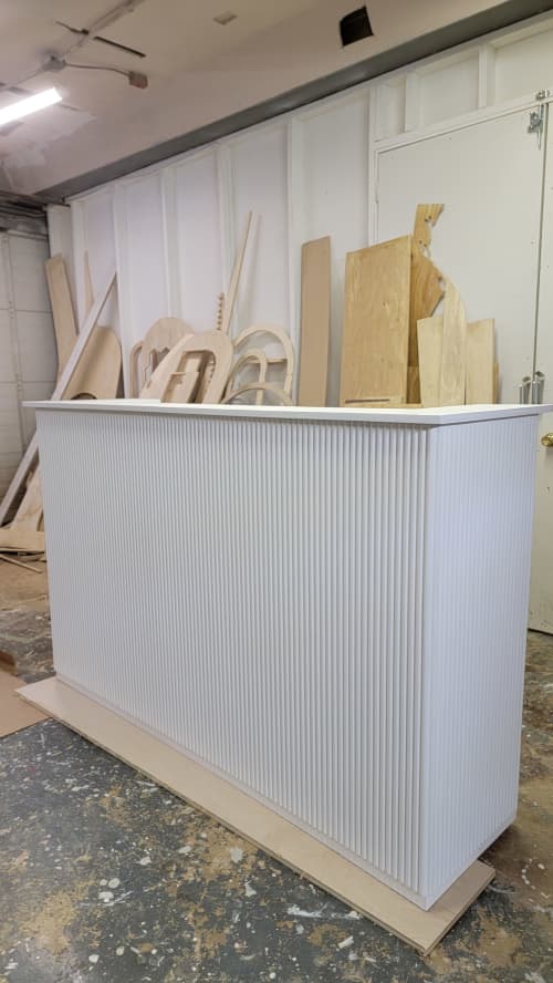 Fluted Front Square Reception Desk | Tables by Son-ya Luch (Owner) SP Fabrication and Design | New York in New York. Item composed of oak wood in boho or country & farmhouse style