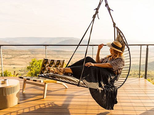 Studio Stirling LEAF chair at Zulu Rock Lodge South Africa | Swing Chair in Chairs by Studio Stirling. Item made of steel works with minimalism & country & farmhouse style