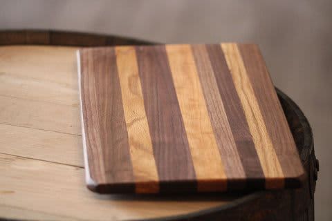 Cutting / Cheese / Charcuterie Board 15.5" x 9" x 5/8" | Serving Board in Serveware by Wild Cherry Spoon Co.. Item composed of oak wood in minimalism or country & farmhouse style