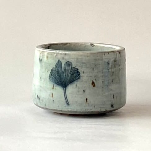 Handmade Tea Cup, Celadon Glaze with Gingko Leaf | Drinkware by cursive m ceramics. Item composed of stoneware
