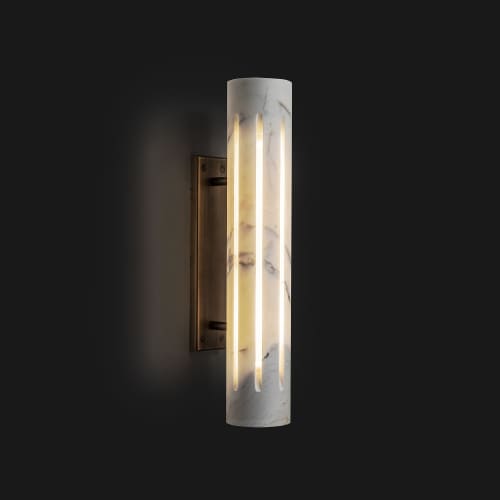 Aura marble sconce | Sconces by ETAMORPH. Item made of stone