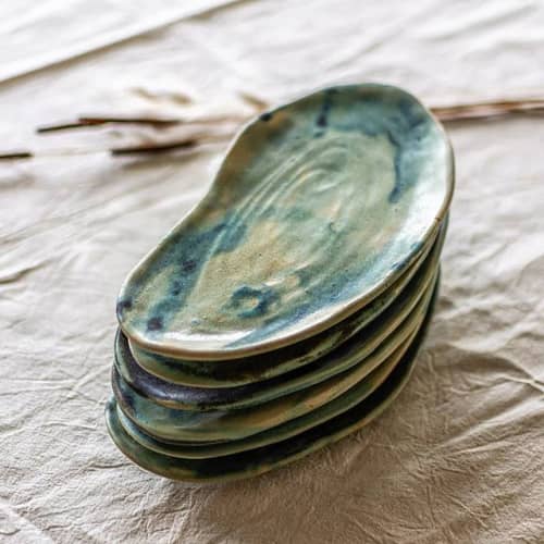 Emerald green oval plate by Eva Kengen at Restaurant Ōvnew, L