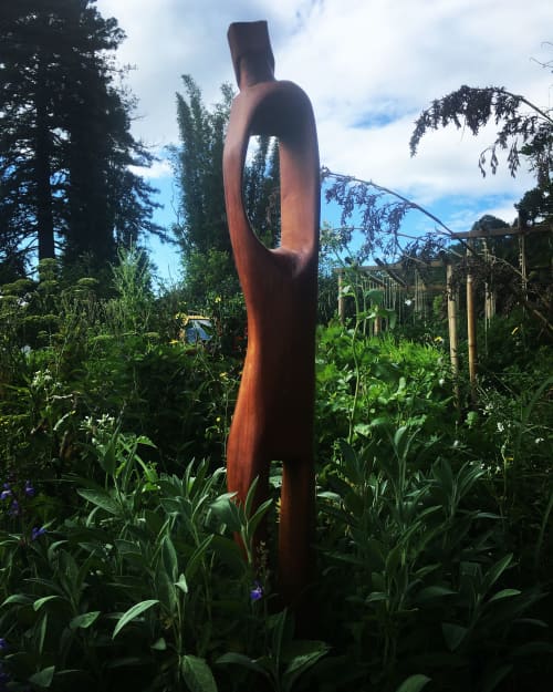 In Different Ways Beautiful | Public Sculptures by Dave Fowell | Eggsentric Cafe And Restaurant in Cooks Beach. Item made of wood