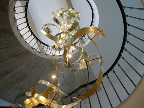 Moebius | Chandeliers by Ombre Portée. Item composed of brass and glass