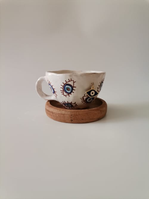 Extra Large Charming Handmade Evil Eye Cup With Saucer | Mug in Drinkware by HulyaKayalarCeramics. Item composed of wood & metal compatible with boho and mid century modern style