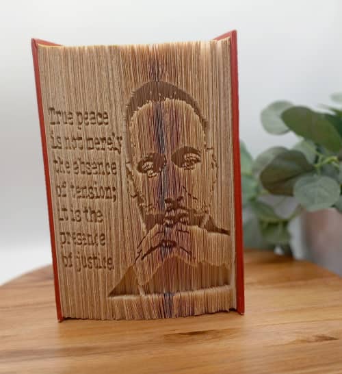 Martin Luther King Jr Folded Book Portrait | Sculptures by Q Wollock. Item made of linen with paper works with contemporary style