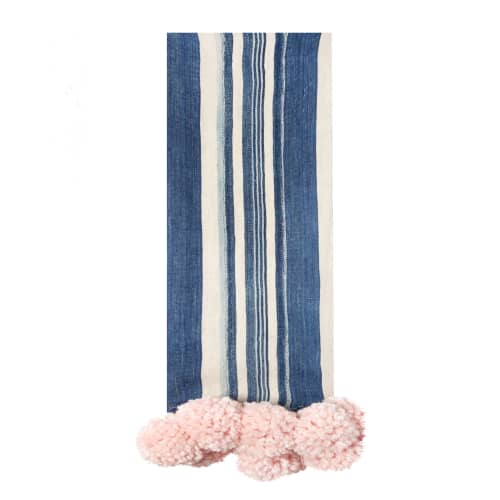 indigo stripe pom pom throw/blush | Apparel in Apparel & Accessories by Charlie Sprout. Item made of fabric