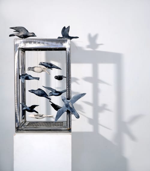 Caged Birds, steel structure with clay bird scuptures | Sculptures by Susan Hostetler Studio