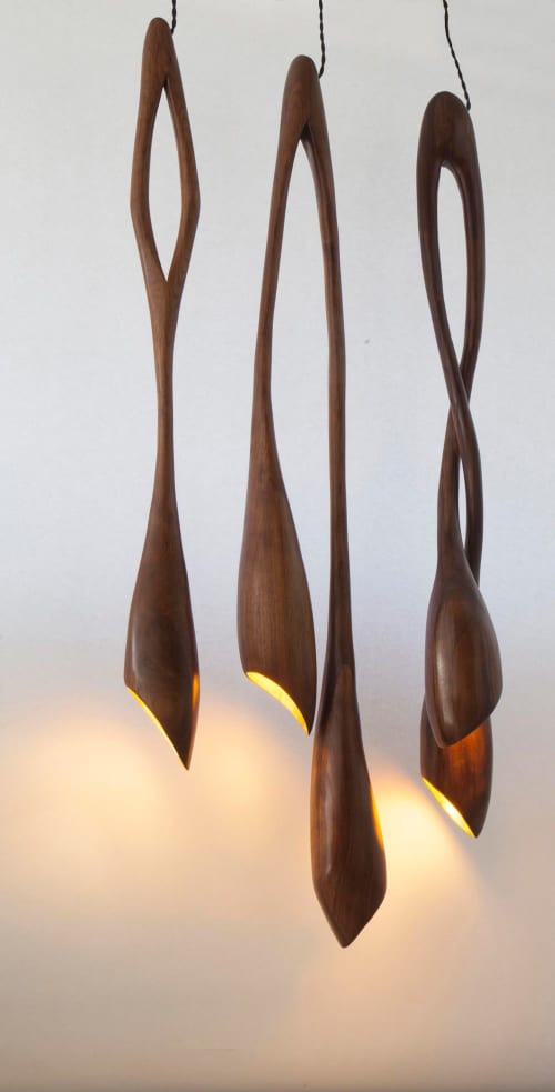 Frida, Jacky & Mathilde | Pendants by Nadine Hajjar Studio. Item made of walnut works with minimalism & mid century modern style