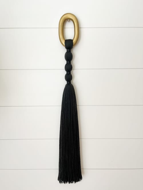 Black and gold Tassel fiber art wall hanging by The Cotton Yarn