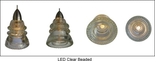 Railroadware - Insulator Lights at Watermans Surfside Grill | Pendants by RailroadWare Lighting Hardware & Gifts | Waterman's Surfside Grille in Virginia Beach. Item composed of glass