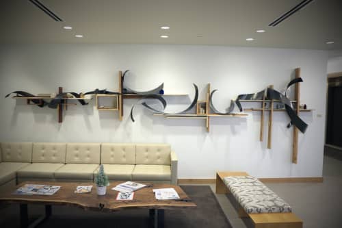 echoes in the distance | Sculptures by Craig Robb | Otten Johnson Robinson Neff + Ragonetti PC in Denver. Item made of wood with steel