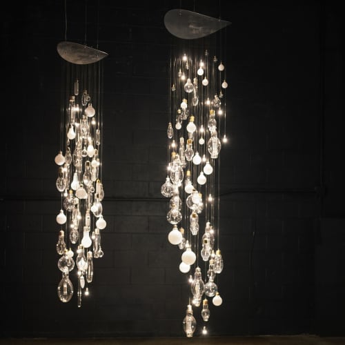 Light Rain Installation | Chandeliers by Umbra & Lux | Salari Fine Carpets in Vancouver. Item composed of glass