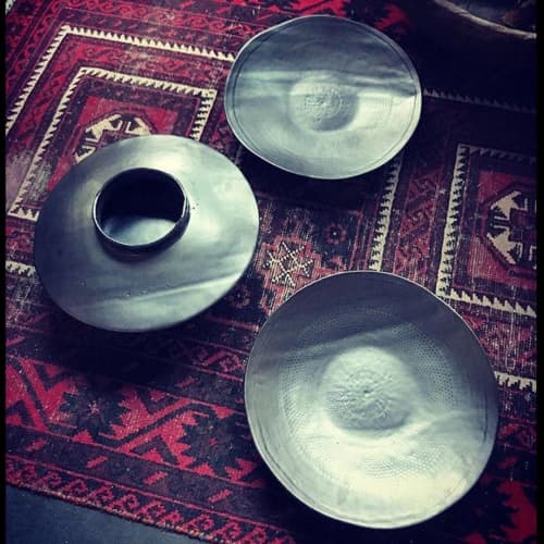 Large scale Stoneware vessel and platters w/ Satin Black glaze | Serveware by Len Carella. Item composed of stoneware