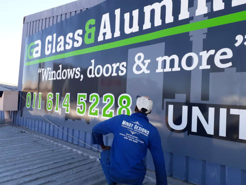 IGA Glass & Aluminium Fascia signwriting | Murals by Mindy Designs Traditional Signwriters & Signmakers , Screen & DIgital Printers. Item composed of synthetic
