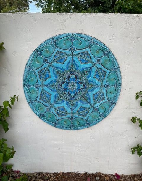 Garden wall outlet art