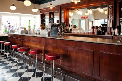 Commercial Retro Bar Stool - Model 1950 | Chairs by Richardson Seating Corporation | Clinton's Soda Fountain in Independence. Item composed of metal and leather