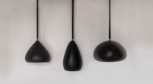 Theo, Rolf, and Walt | Pendants by Nadine Hajjar Studio. Item composed of wood & metal compatible with minimalism and contemporary style