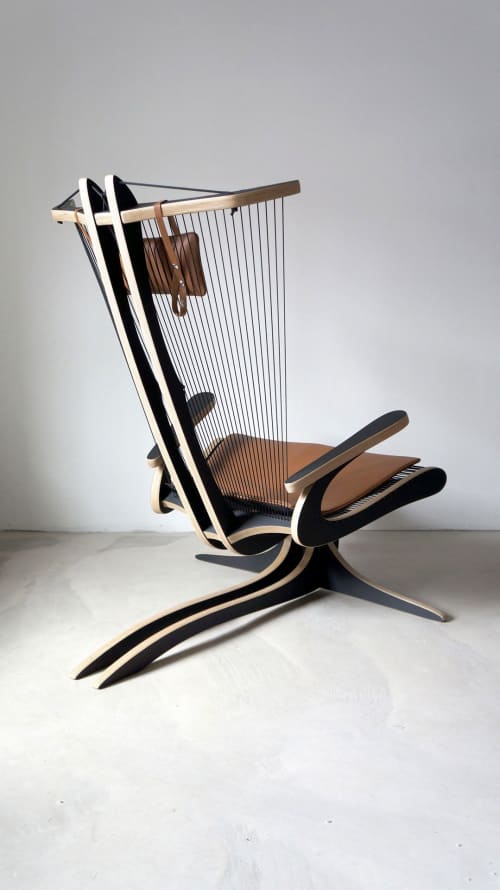 Hippokamp Lounge Chair | Chairs by Peter Qvist | Hornbæk in Hornbæk. Item made of birch wood