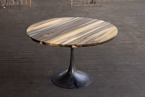 Rainbow Poplar Round Wood Top Cast Iron Amicalola Base | Dining Table in Tables by Alabama Sawyer. Item made of oak wood with metal
