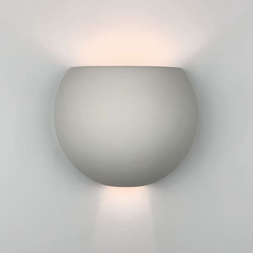 Curacoa Wall Sconce | Cut Globe Up Down Wall Sconce | Sconces by A19 Artisan Lighting. Item composed of ceramic in minimalism or mid century modern style
