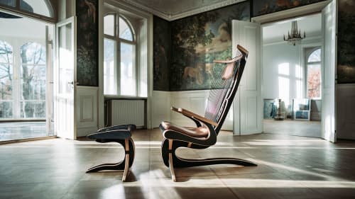Hippokamp Lounge Chair & Footstool - Leather | Chairs by Peter Qvist. Item composed of birch wood and leather in minimalism or contemporary style