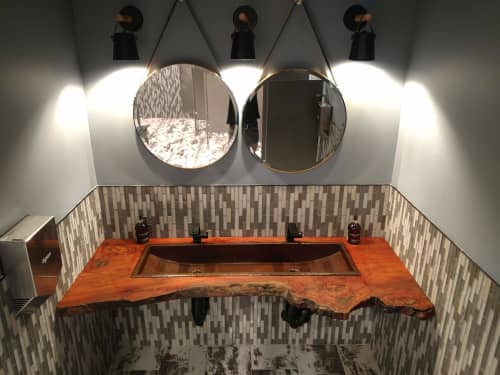 Live Edge Red Gum Wood Countertops for JSX Skyharbor lounge | Furniture by Lumberlust Designs | 2700 E Old Tower Rd in Phoenix. Item made of wood