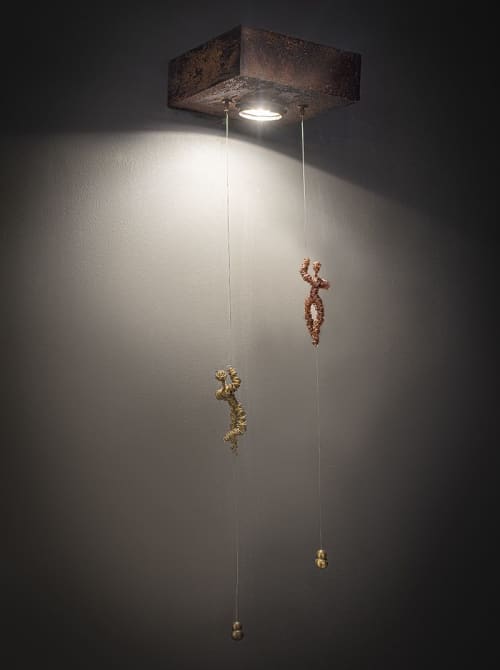 Acrobats | Pendants by F+M FOS - Anna Maria Fragiskos Bitros | ALPHA ESTATE - KTIMA ALFA in Aminteo. Item composed of wood & metal compatible with modern style