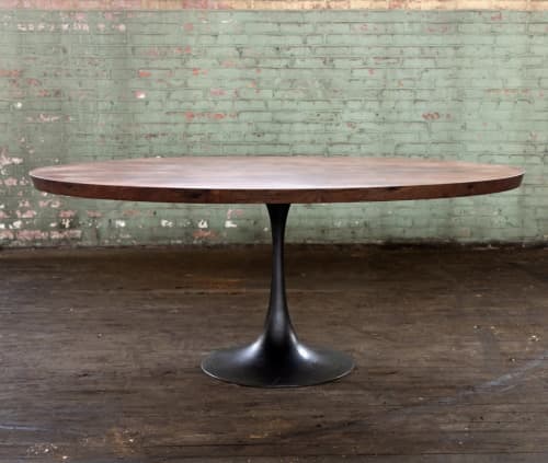 Oval metal on sale dining table