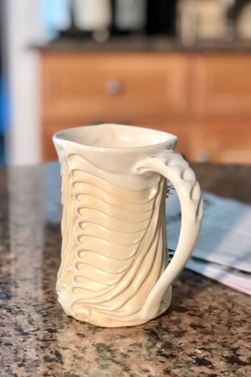 Bony Mug in Ivory | Drinkware by Lora Rust Ceramics. Item composed of ceramic