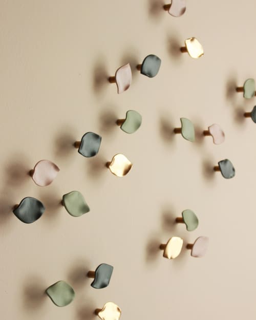 Titled "The Softness," porcelain ceramic petal sculpture | Wall Sculpture in Wall Hangings by Elizabeth Prince Ceramics. Item composed of metal and ceramic in contemporary or japandi style