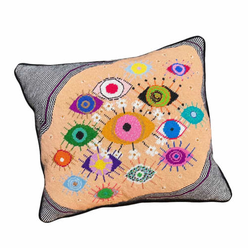 hand-embroidered needlepoint idolEYES original pillow, OOAK | Pillows by Mommani Threads. Item composed of wool in contemporary or eclectic & maximalism style