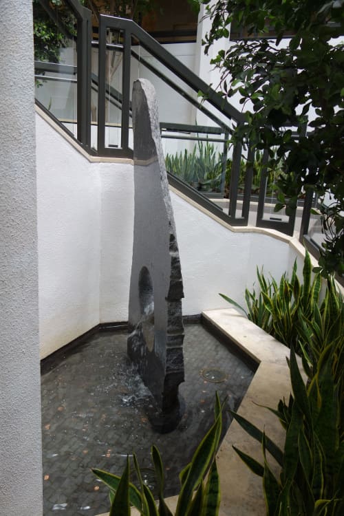 ELLA RACING THE WIND | Public Sculptures by Perci Chester | Galleria Edina in Edina. Item composed of stone