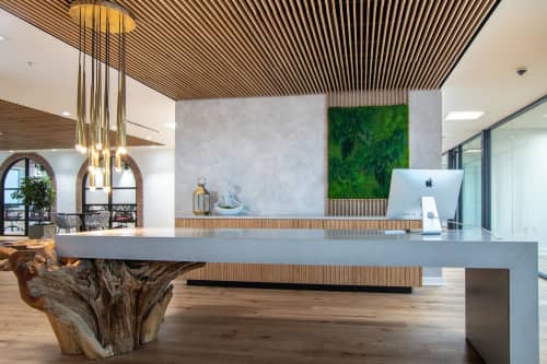 Teak and Concrete Reception Desk | Tables by Béton Studio | The Ring Workspaces in Clearwater. Item made of cement