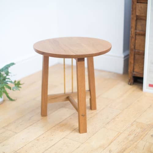 Side table | Tables by Majid Lavasani. Item made of oak wood with brass