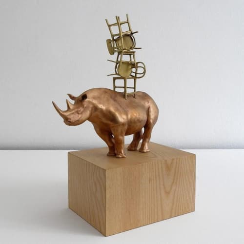 "Rhino with chairs" | Sculptures by MARCANTONIO. Item composed of wood and bronze