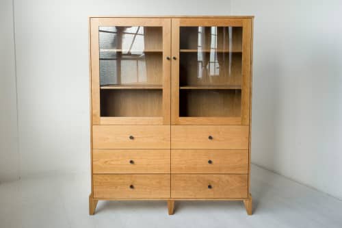Pacific Curio Cabinet in American Cherry | Storage by Studio Moe. Item composed of wood