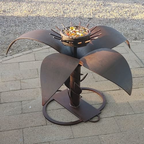 "Fire Flower I" Garden of Life Series | Coffee Table in Tables by Brian Schader. Item composed of bronze & glass compatible with contemporary and industrial style