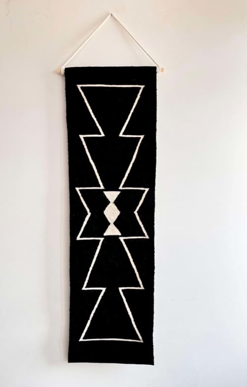 Mut Handwoven Wool Tapestry – Black & Cream Geometric | Wall Hangings by Mumo Toronto. Item made of fabric works with boho & contemporary style
