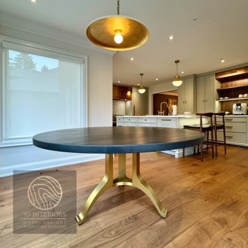 Charcoal walnut brass tripod wishbone table | Dining Table in Tables by YJ Interiors. Item made of oak wood & brass compatible with mid century modern and eclectic & maximalism style